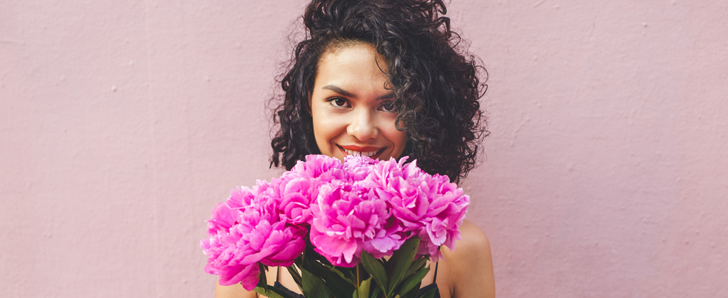 Woman Feels Good with Flowers